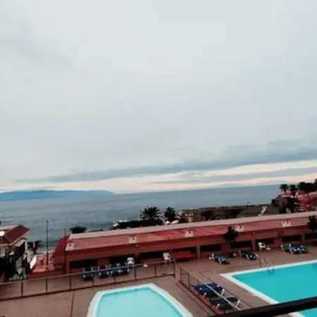Puesta De Sol En Playa La Arena